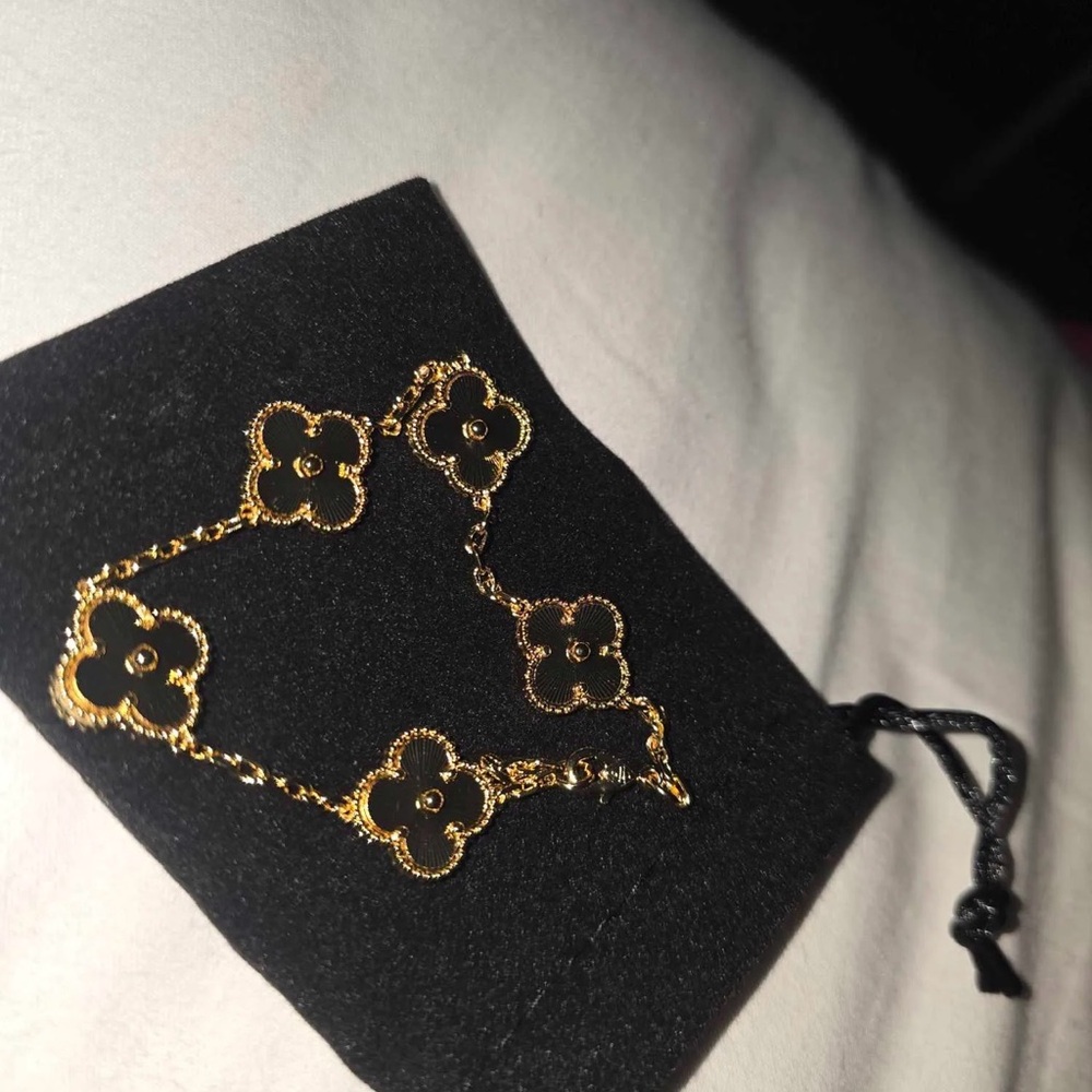 Elegant Gold and Black Floral Bracelet